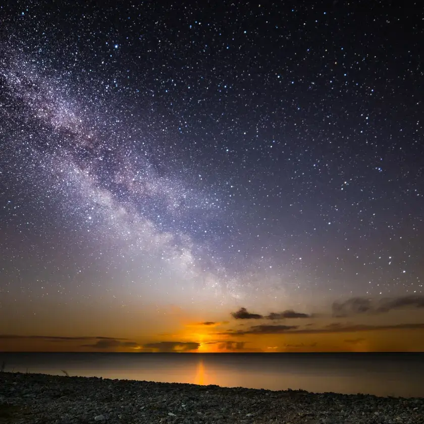 Moon rising under Milky Way